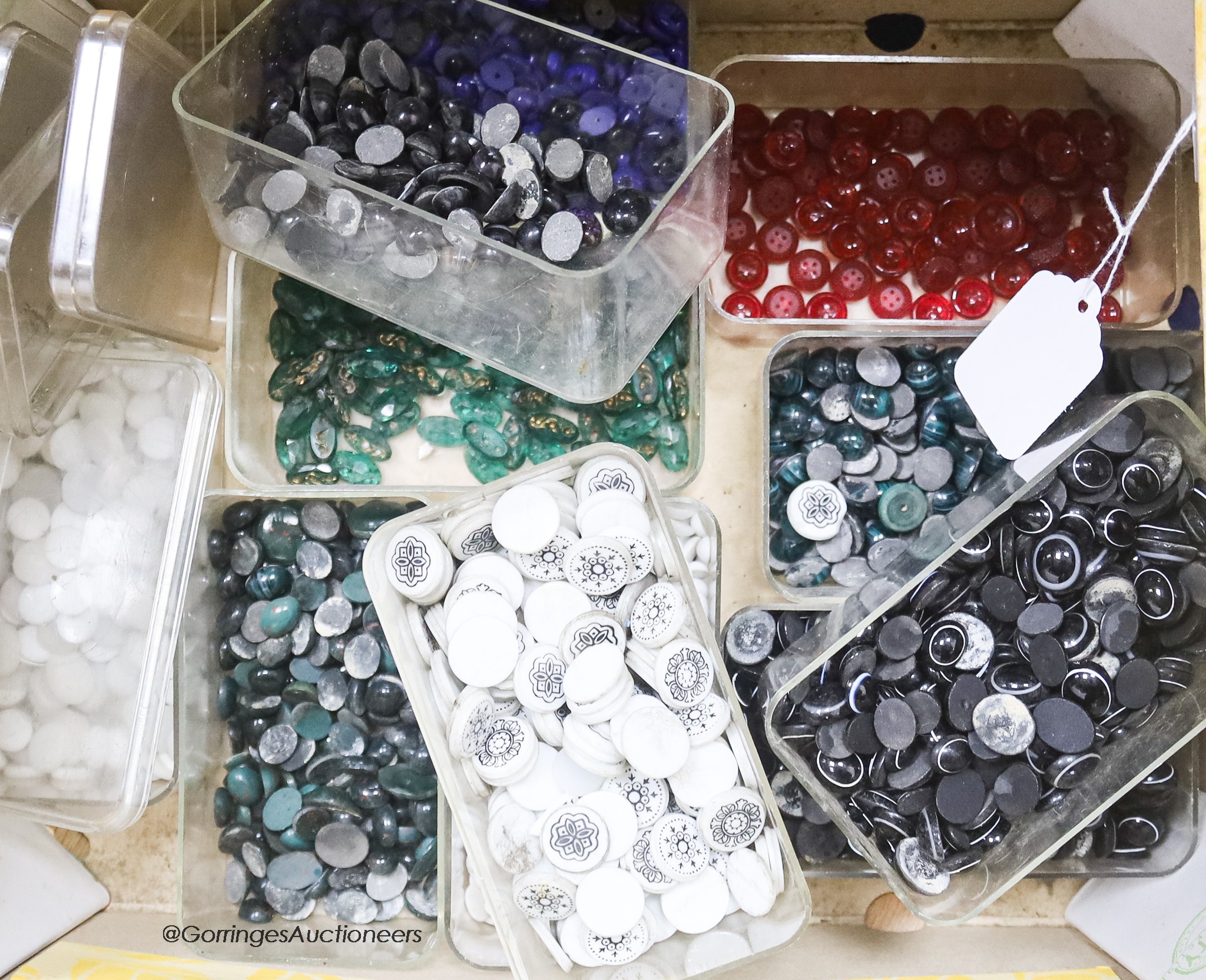 A large collection of paste and gem stone cabochons and other shapes